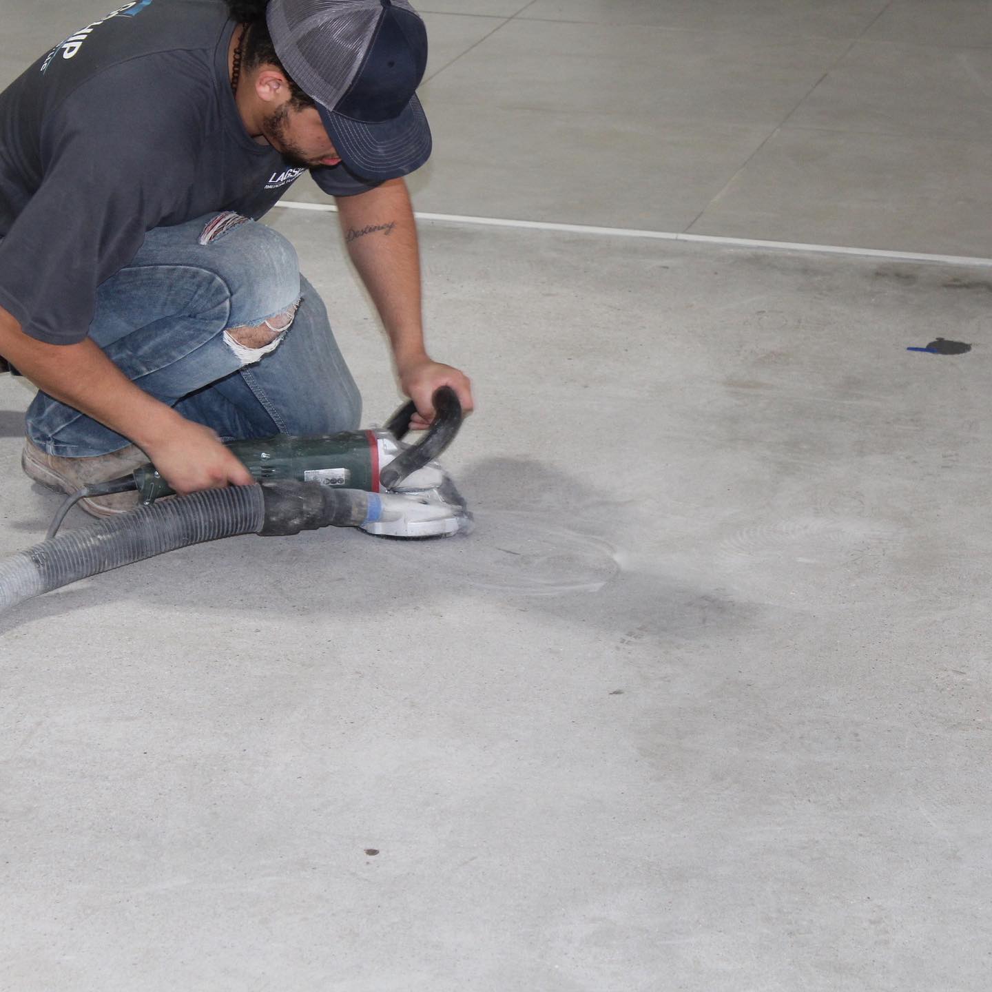 Epoxy-flake install for Mears Mazda Volvo service department in Lubbock, TX