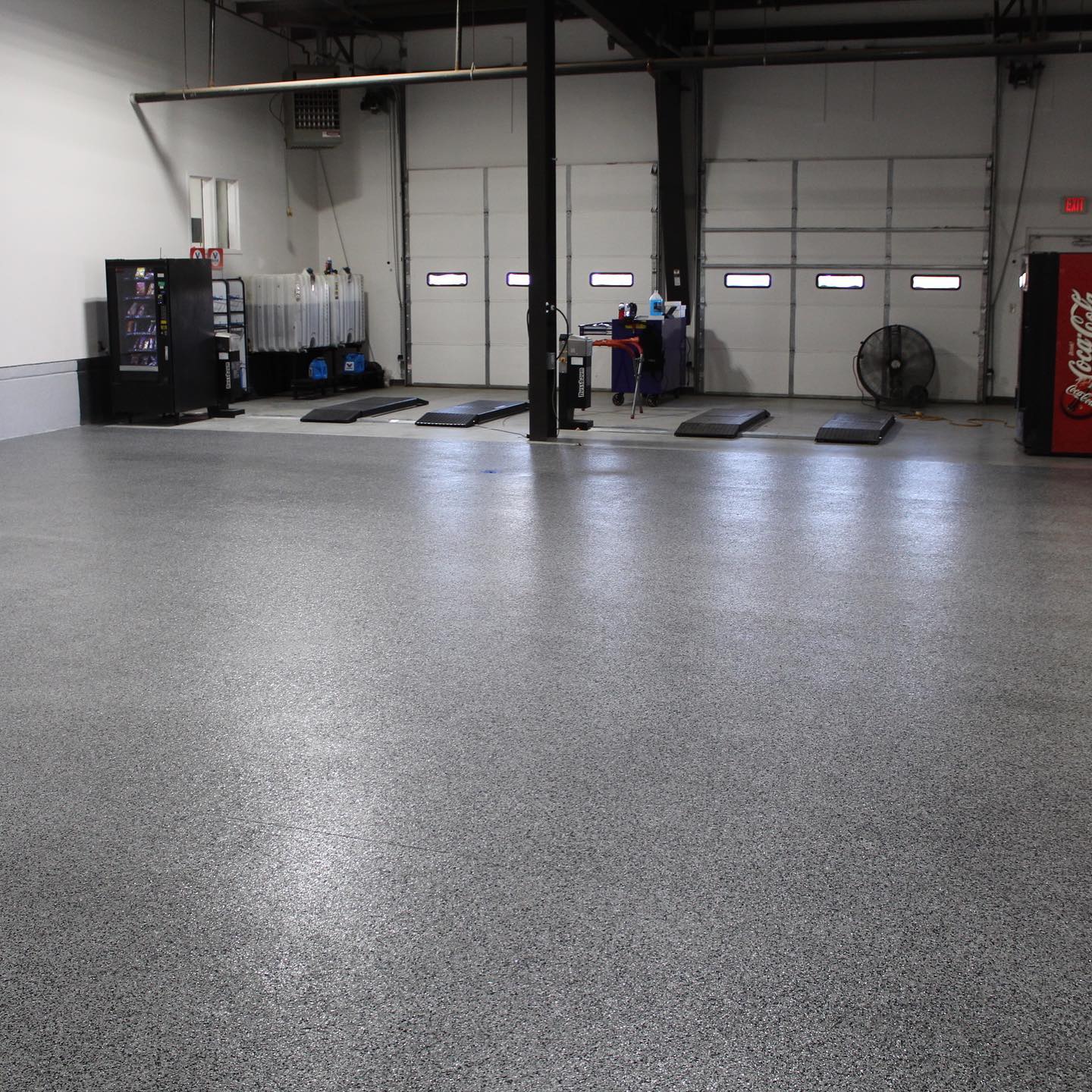 Epoxy-flake install for Mears Mazda Volvo service department in Lubbock, TX