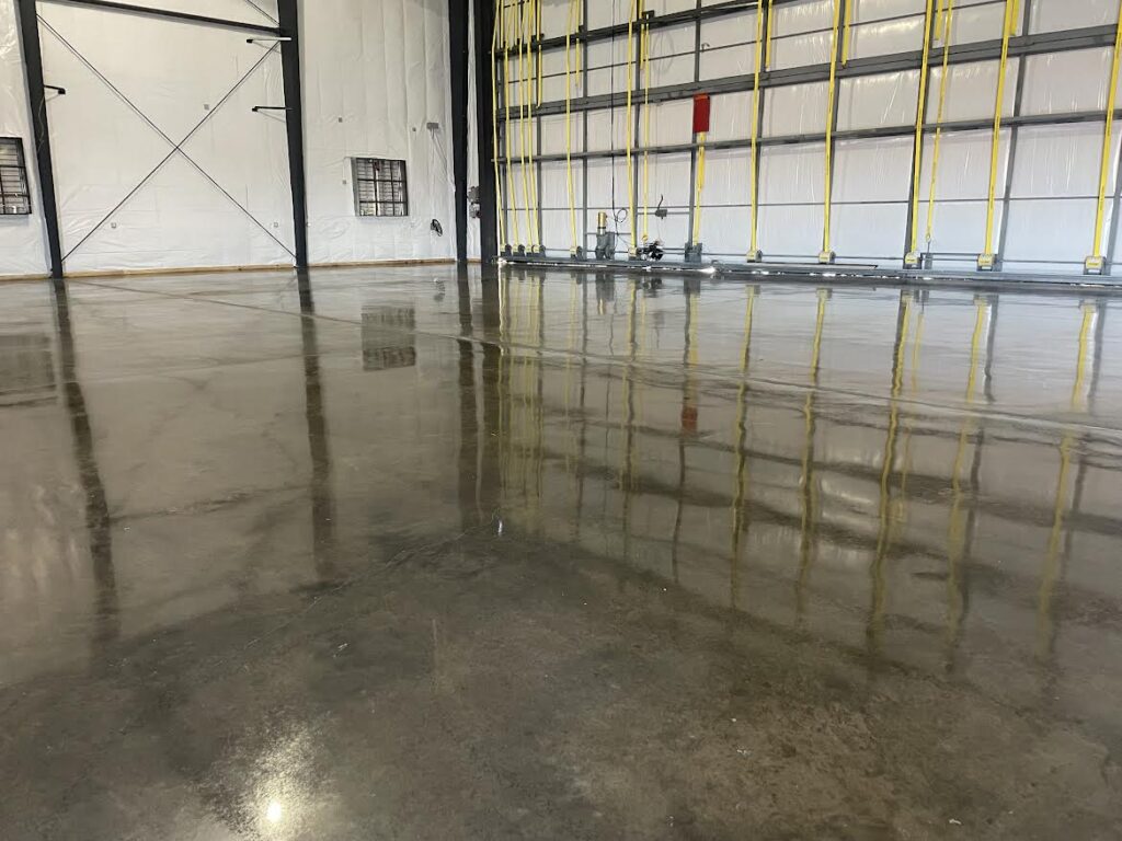 polished concrete airplane hangar flooring